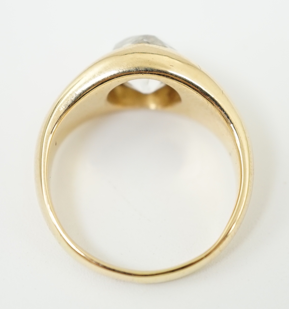 A George V 18ct gold and solitaire diamond gypsy set ring